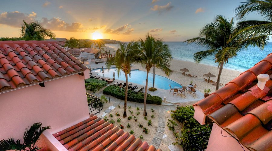 Frangipani Beach Resort beachfront and pool