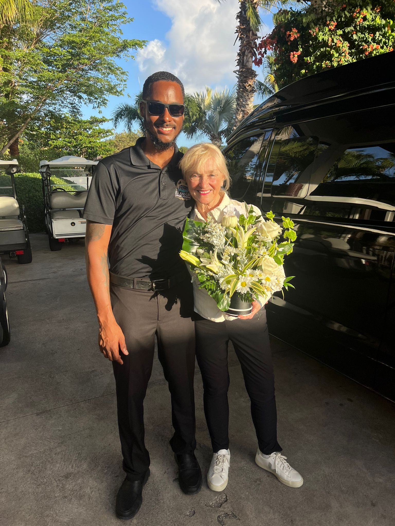 Island Life owner with guest — Anguilla luxury chauffeur